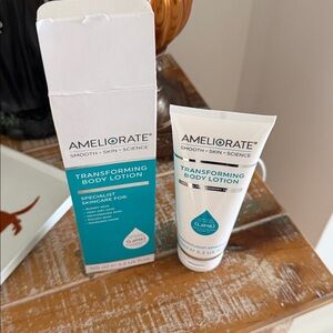Ameliorate Transforming Body Lotion 3.3 Fl Oz
White and Teal